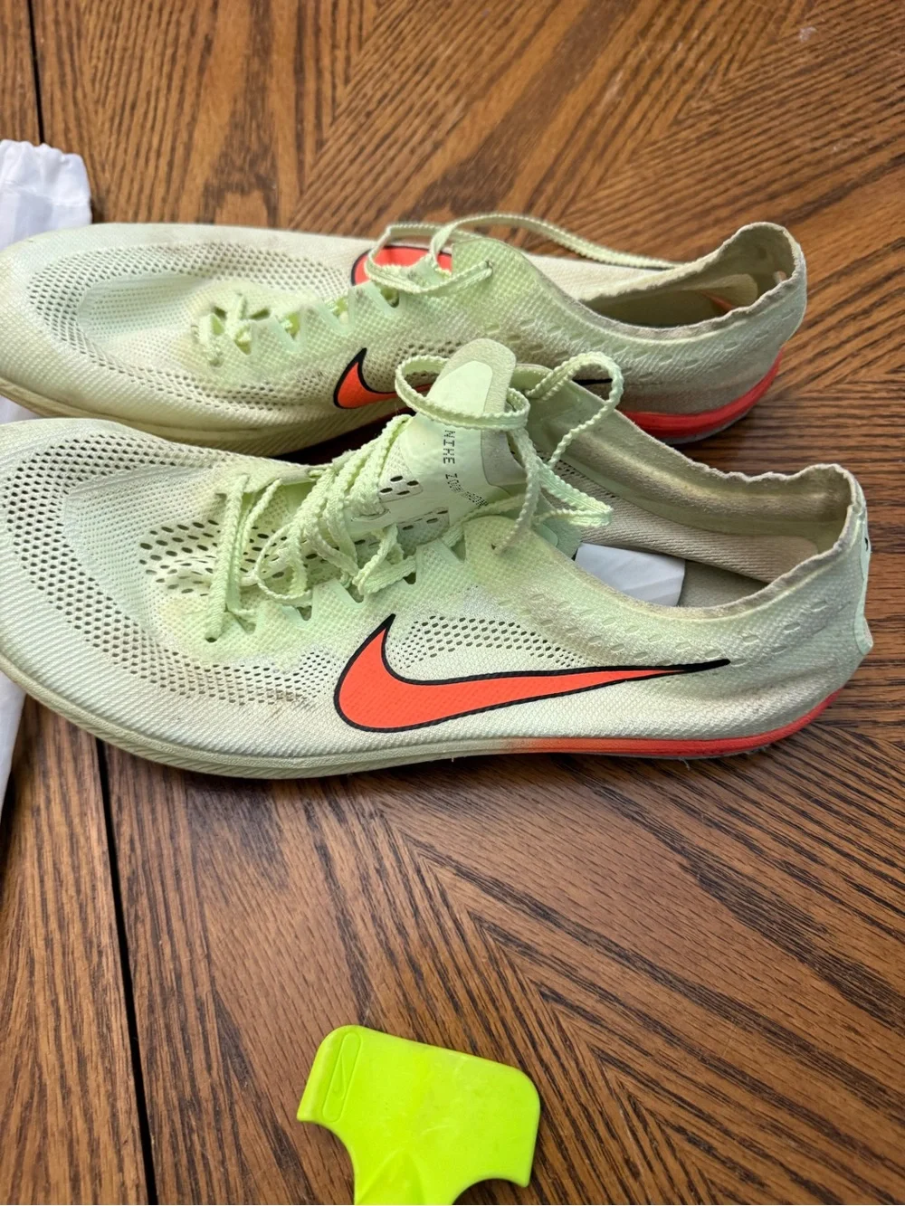 Nike Racing Shoes - Light Green with Orange Swoosh